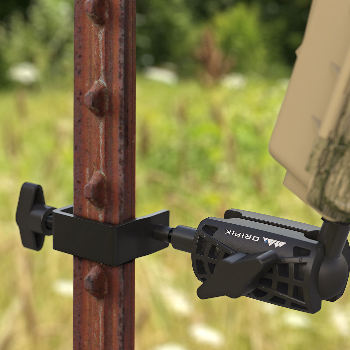 Close-up of ORIPIK camera mount clamped to a T-post