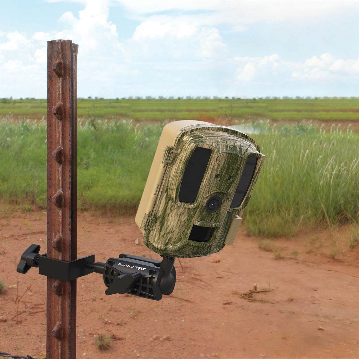 ORIPIK T-post camera mount shown in a field use scenario